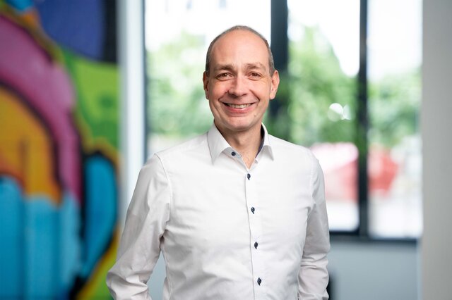 Carsten Fritz smiling at the viewer